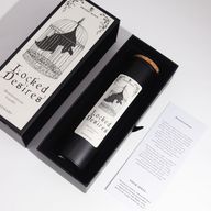 Locked Desires black candle with cork lid inside its gift box