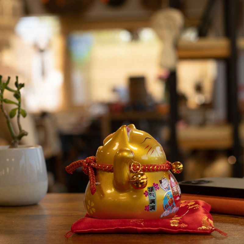 Ceramic Money Cat Bank - Gold on Cushion