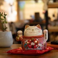 Ceramic Money Cat Moving Hand - Pink on Cushion (battery not included)