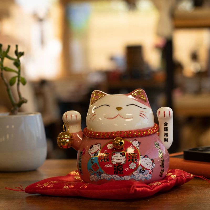 Ceramic Money Cat Moving Hand - Pink on Cushion (battery not included)