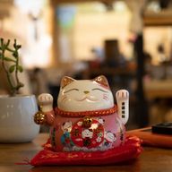Ceramic Money Cat Moving Hand - Pink on Cushion (battery not included)