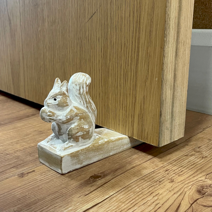 Hand carved wooden door stopper
